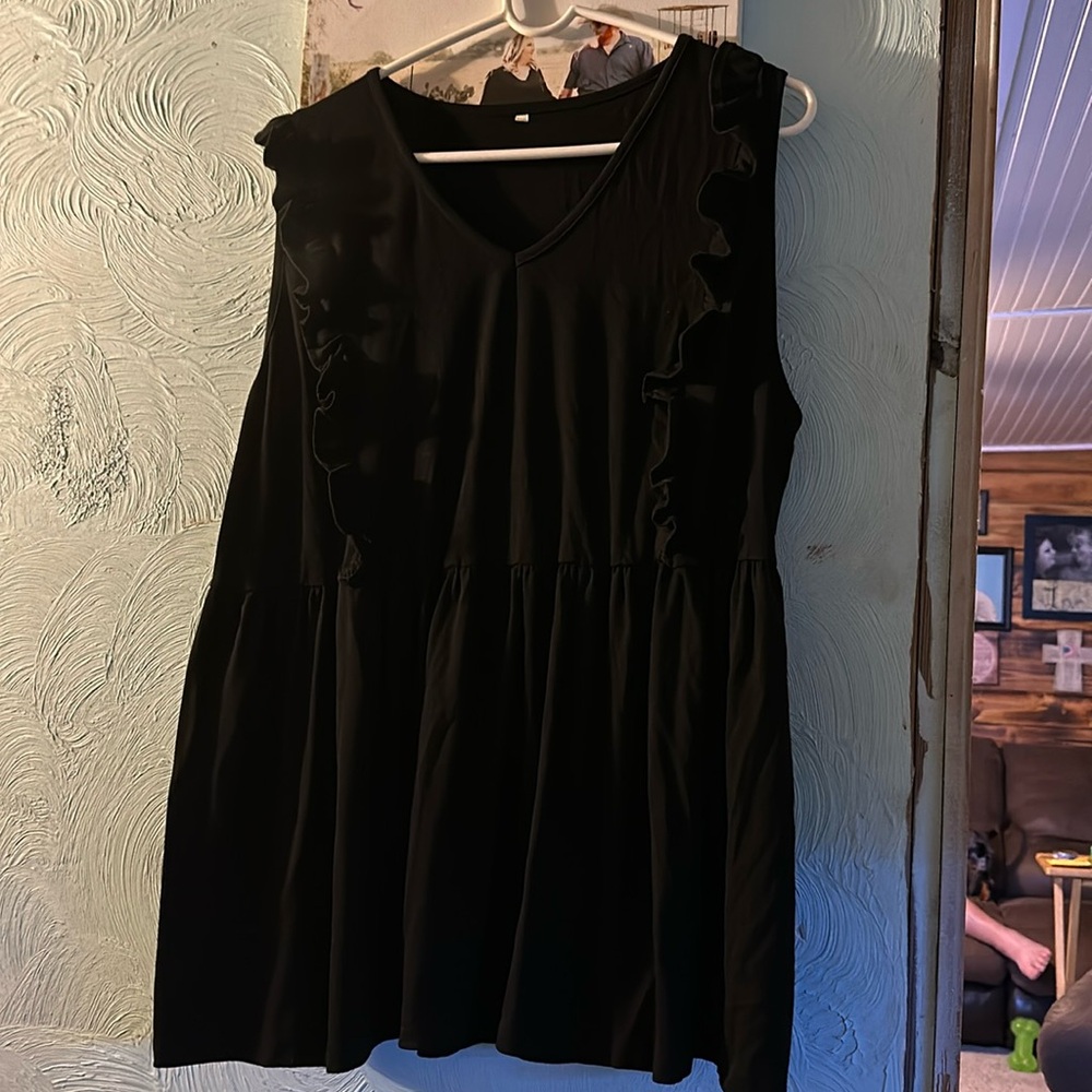 Black tank top with ruffle on front